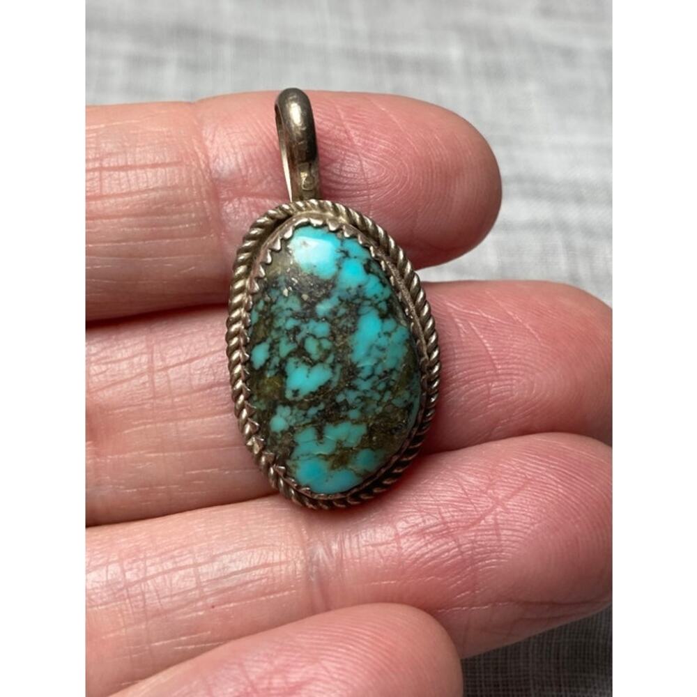 Turquoise setting in sterling silver pendant